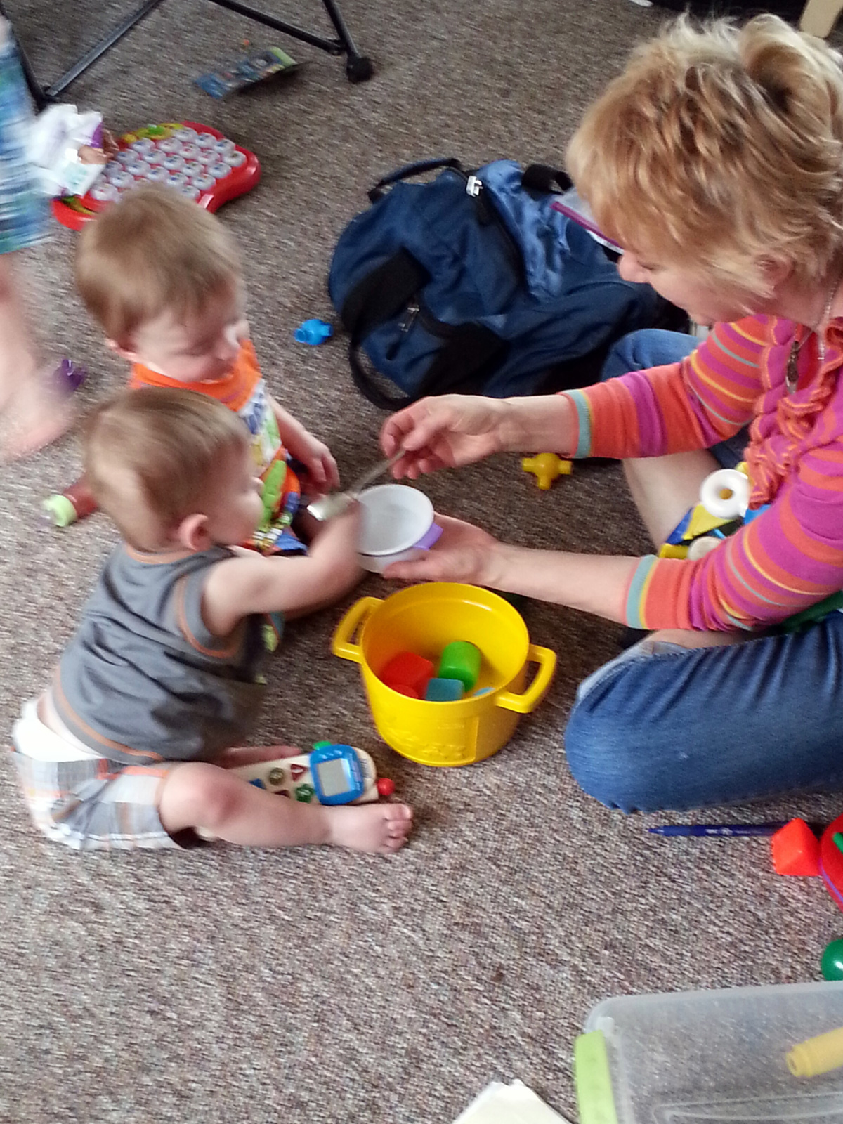 Wendy DeGeest works with two young boys in their Brainerd home. Most of her early childhood special education work is done in people's homes. Photo courtesy of Wendy DeGeest.