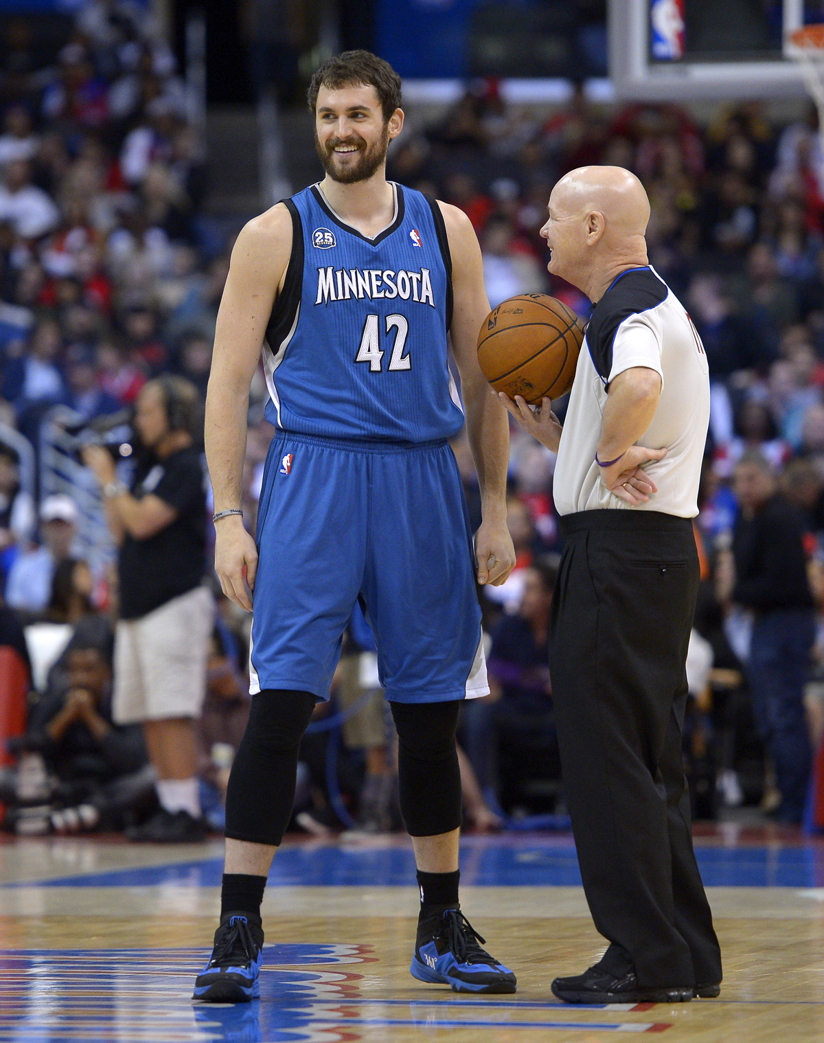 Minnesota Timberwolves forward Kevin Love, left, talks with referee Joe Crawford prior to an NBA basketball game against the Los Angeles Clippers, Monday  in Los Angeles. (AP Photo/Mark J. Terrill)