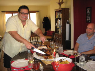 Chef John Michael Lerma carving the Thanksgiving turkey in 2008 with his partner, Chad Olson. Lerma died Nov. 7, 2013. (Photo/Laura McCallum)