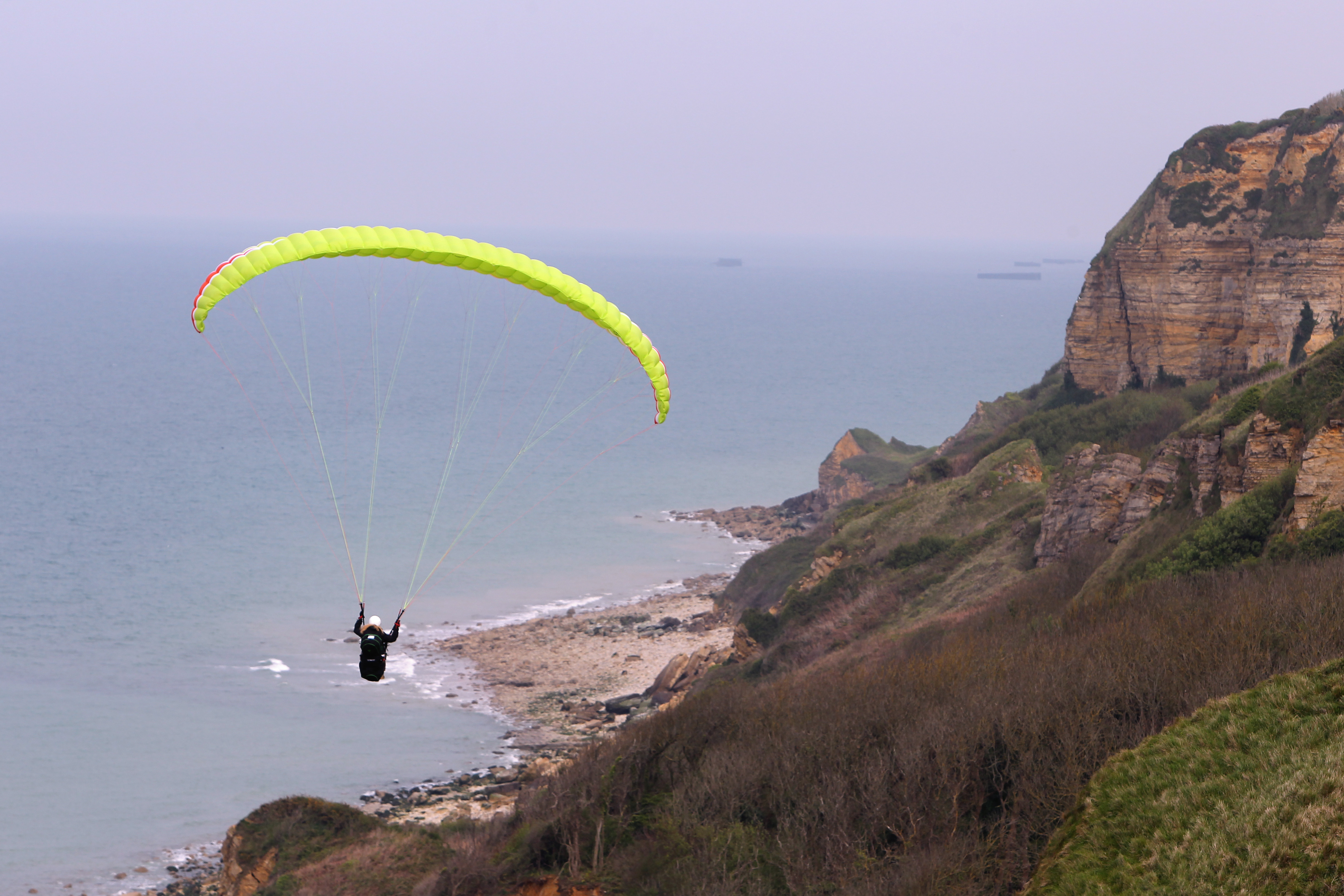 Paragliding tour over the D-Day beaches, in Port en Bessin, western France, Thursday, April 24, 2014Local officials estimate that several hundred thousand tourists will flock to Normandy this summer, attracted by the 70th anniversary of D-Day next June 6. (AP Photo/David Vincent)