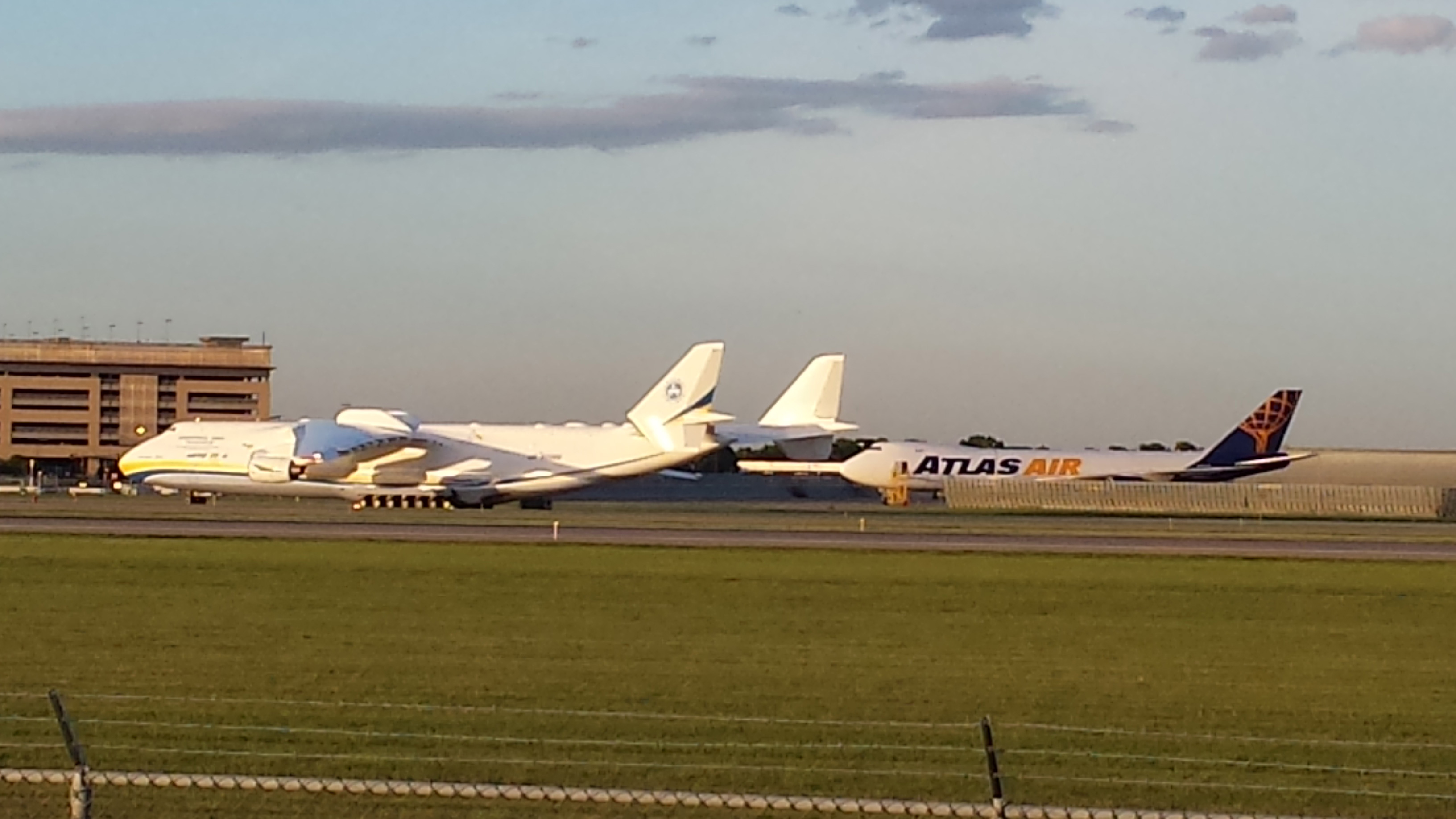 A 747, diverted from Chicago because of storms, is dwarfed by the Antonov 225 at Minneapolis Saint Paul International Airport.  Photo: Bill Catlin/Minnesota Public Radio News.