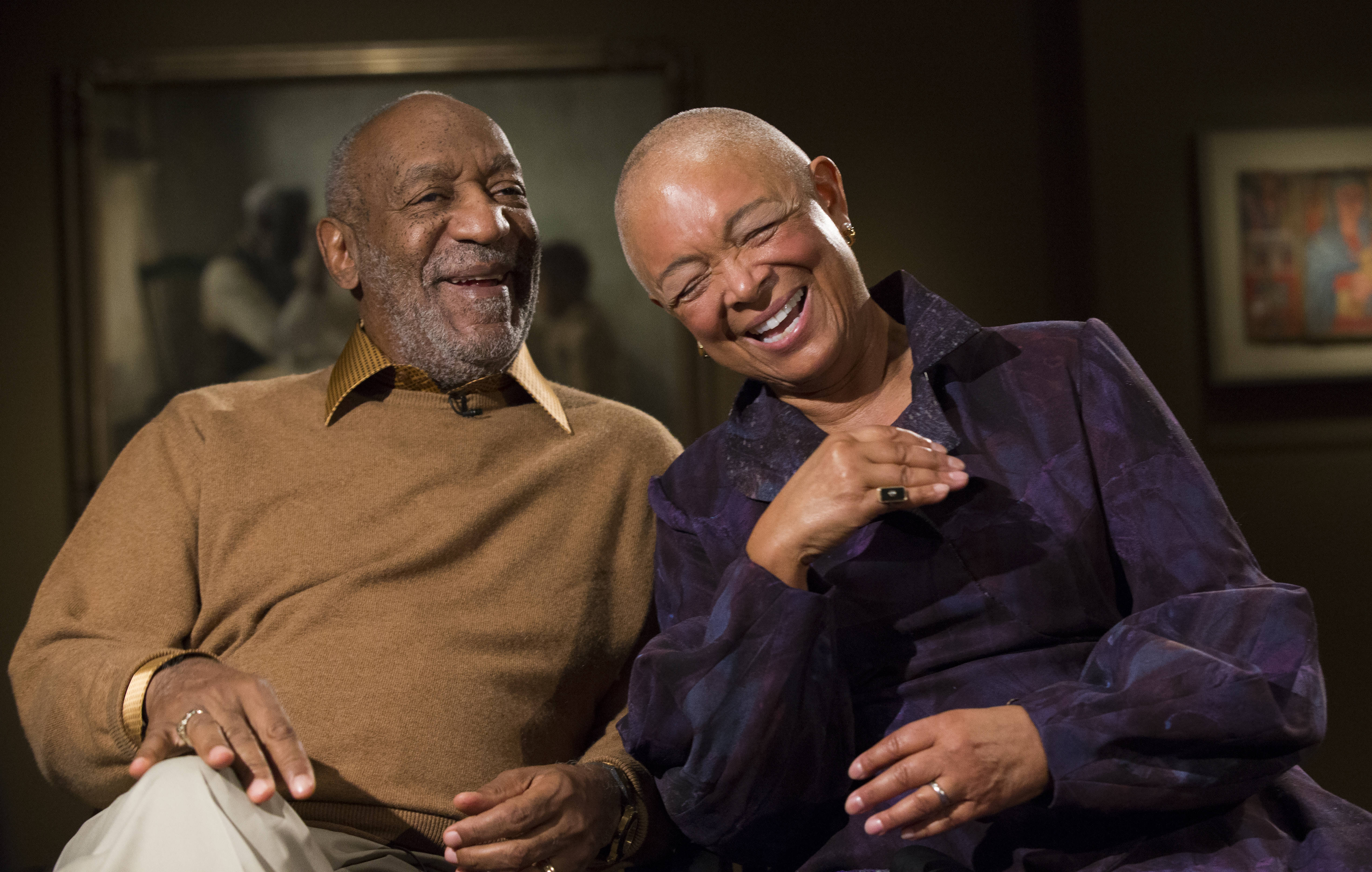 Bill Cosby and his wife Camille share a laugh as they tell a story about collecting on of the pieces in the upcoming exhibit, Conversations: African and African-American Artworks in Dialogue, at the Smithsonian's National Museum of African Art . (AP Photo/Evan Vucci)