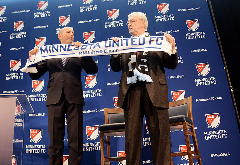 Major League Soccer Commissioner Don Garber, left, welcomed Minnesota United owner Bill McGuire to the top level of professional soccer during a news conference, Friday, March 25, 2015. Tim Nelson | MPR News