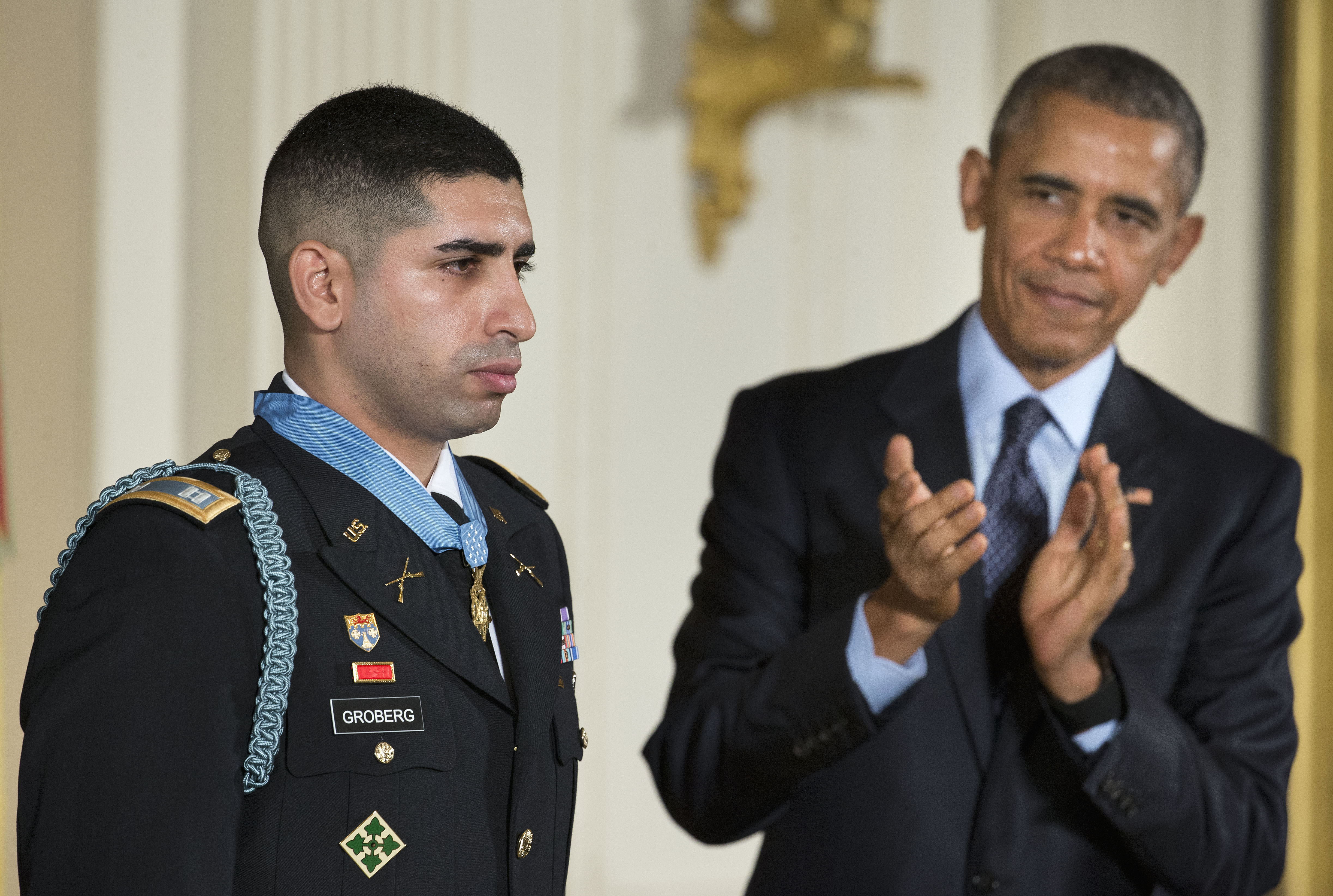 President Barack Obama applauds after bestowing the nation's highest military honor, the Medal of Honor to Florent Groberg during a ceremony in the East Room of the White House in Washington, Thursday, Nov. 12, 2015. The former Army captain received the medal after he tackled a suicide bomber while serving in Afghanistan. (AP Photo/Pablo Martinez Monsivais)