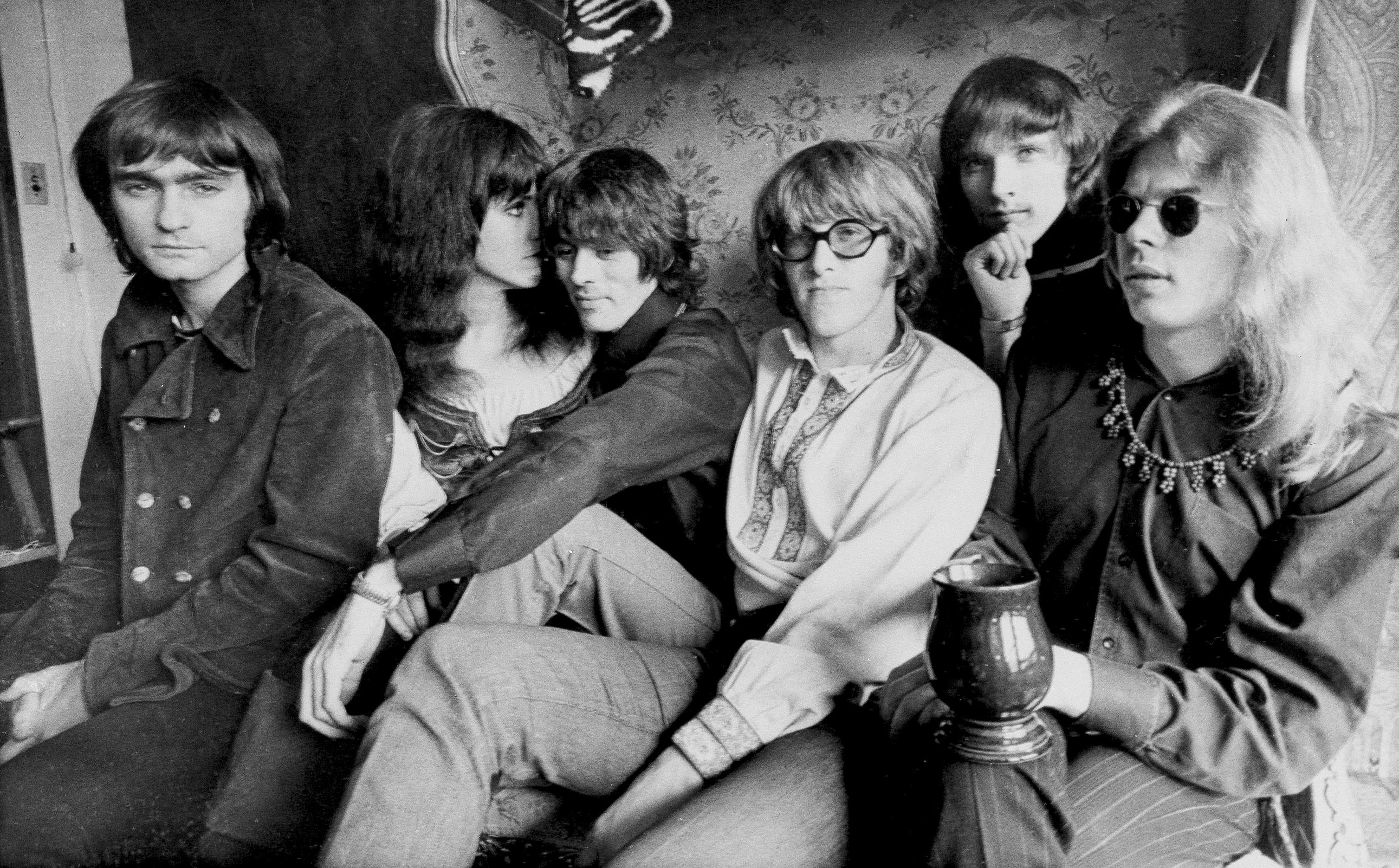 The rock band Jefferson Airplane pose in their Pacific Heights, San Francisco apartment, Dec. 5, 1968. From left: Marty Balin, Grace Slick, Spencer Dryden, Paul Kantner, Jorma Kaukonen and Jack Casady. (AP Photo)