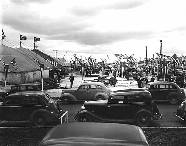 The Montgomery Ward's tent on Machinery Hill around 1940. Photographer: Paul Wright Studios of Photography. Minnesota Historical Society.