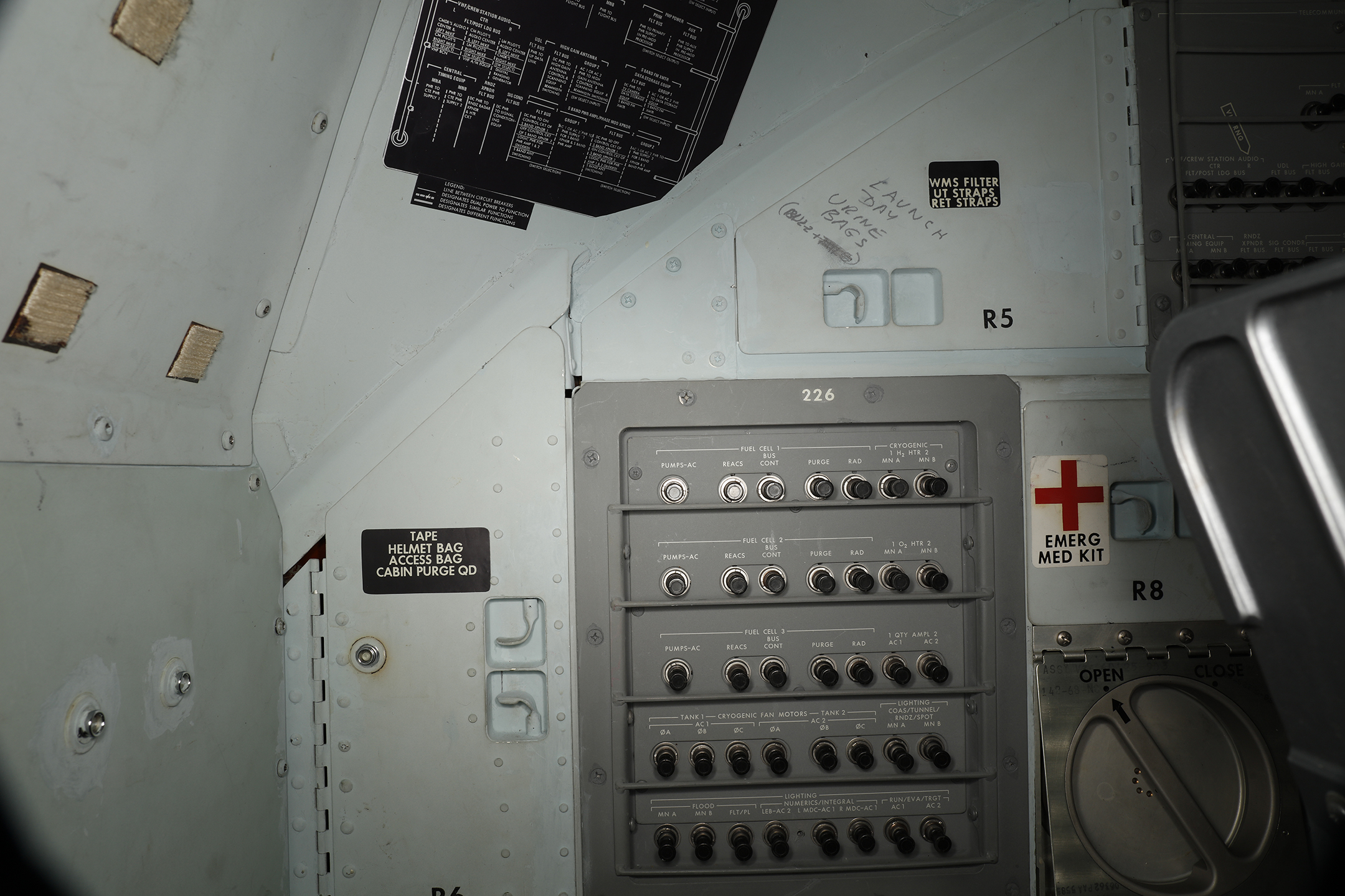 These notes illustrate improvisation during the mission and modification of pre-flight plans for what items were to be placed in each locker. The reasons suggest something about what life was like on the way to the moon and back. Photo: Smithsonian Institution .
