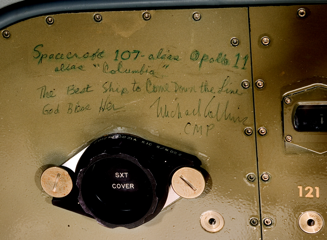 Following splashdown,while en route to Hawaii on the USS Hornet, Michael Collins crawled back into the command module (it was connected to the mobile quarantine facility by an air-tight tunnel) and wrote this short note on one of the equipment bay panels. The inscription reads: Spacecraft 107, alias Apollo 11, alias 'Columbia.' The Best Ship to Come Down the Line. God Bless Her. Michael Collins, CMP Photo: National Air and Space Museum, Smithsonian Institution .