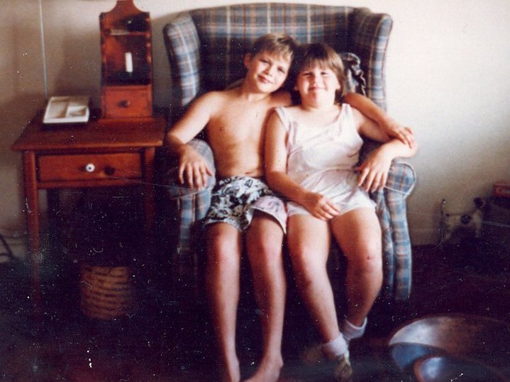 Sean Smith, 10, with his sister Erin, 8, at home on June 4, 1989,” the day before her death. Courtesy of Lee Smith