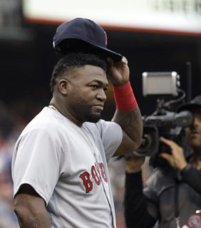 Boston Red Sox David Ortiz tips his hat to fans during a ceremony commemorating his last appearance in a series against the San Francisco Giants prior to a baseball game Tuesday, June 7, 2016, in San Francisco. (AP Photo/Ben Margot)