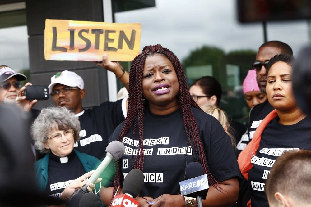 Minneapolis NAACP President Nekima Levy-Pounds called for a "paradigm shift" after federal authorities decided not to charge two Minneapolis officers with violating Jamar Clark's civil rights. "We need to be the change that we want to see." Evan Frost | MPR News