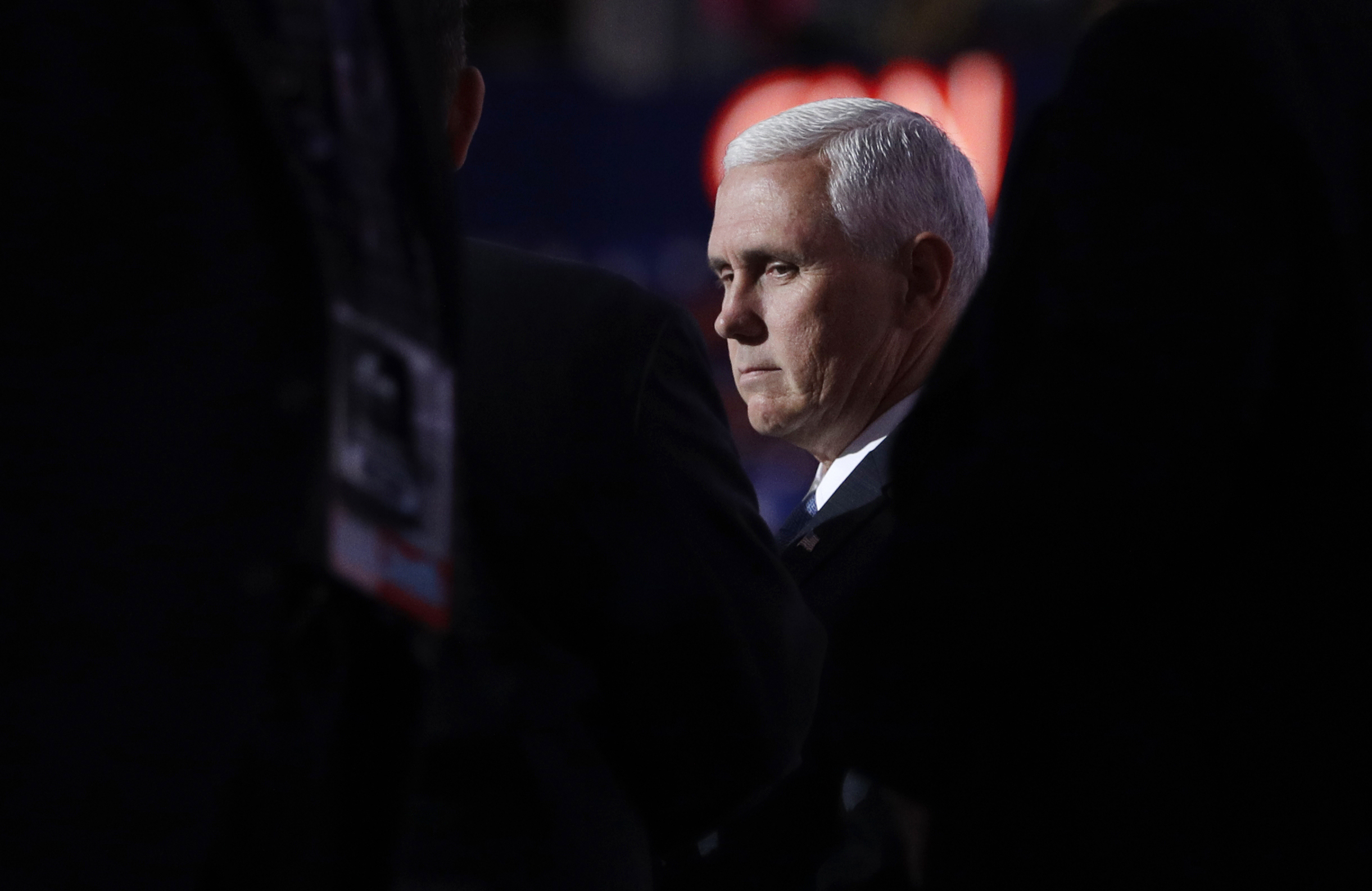 Vice Presidential nominee Gov. Mike Pence of Indiana stands on stage before the third day session of the GOP 2016 Convention, Wednesday, July 20, 2016, in Cleveland. (AP Photo/John Locher)