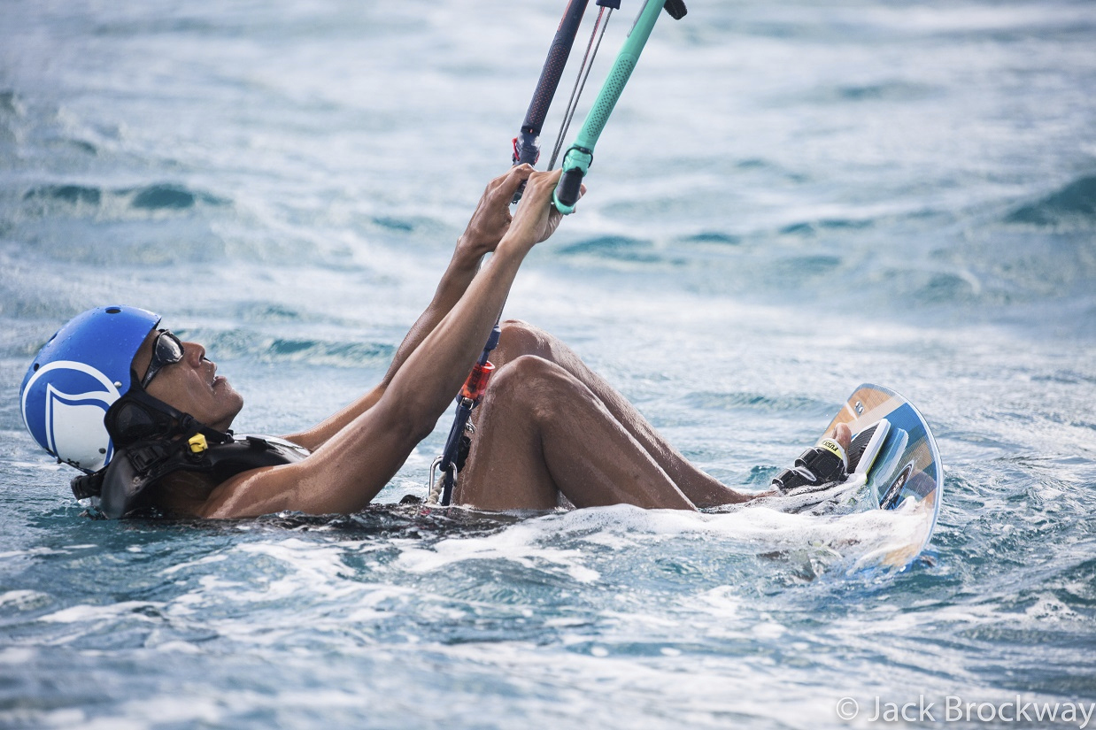 In this recent but undated photo made available by Virgin.com, former U.S President Barack Obama prepares to kitesurf during his stay on Moskito Island, British Virgin Islands. The former president and his wife stayed on Mosikto Island owned by Richard Branson, founder of the Virgin Group, after he finished his second term as President and left the White House. (Jack Brockway/Virgin.com via AP)