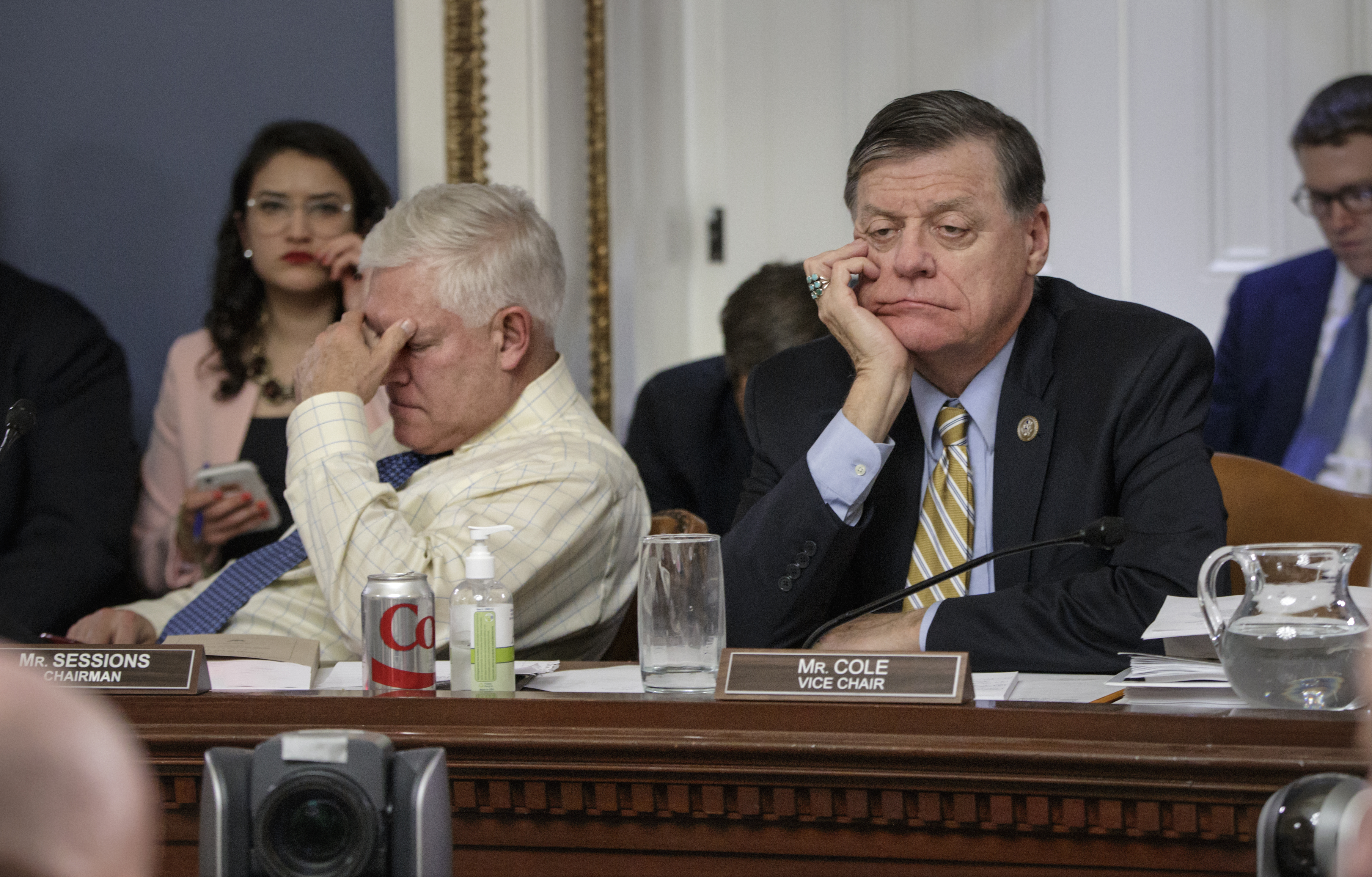After eight hours of debate, House Rules Committee Chairman Rep. Pete Sessions, R-Texas, left, and Rep. Tom Cole, R-Okla., the vice-chair, listen to arguments from committee chairs as the panel meets to shape the final version of the Republican health care bill before it goes to the floor for debate and a vote, Wednesday, March 22, 2017, on Capitol Hill in Washington. Photo: J. Scott Applewhite | Associated Press.