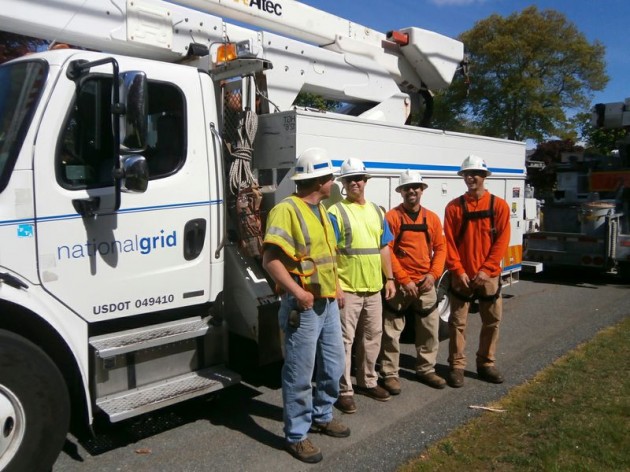 Crews like the National Grid workmen are on the front lines of grid repair when something goes wrong with the system. (Photo courtesy of JT Thomas)